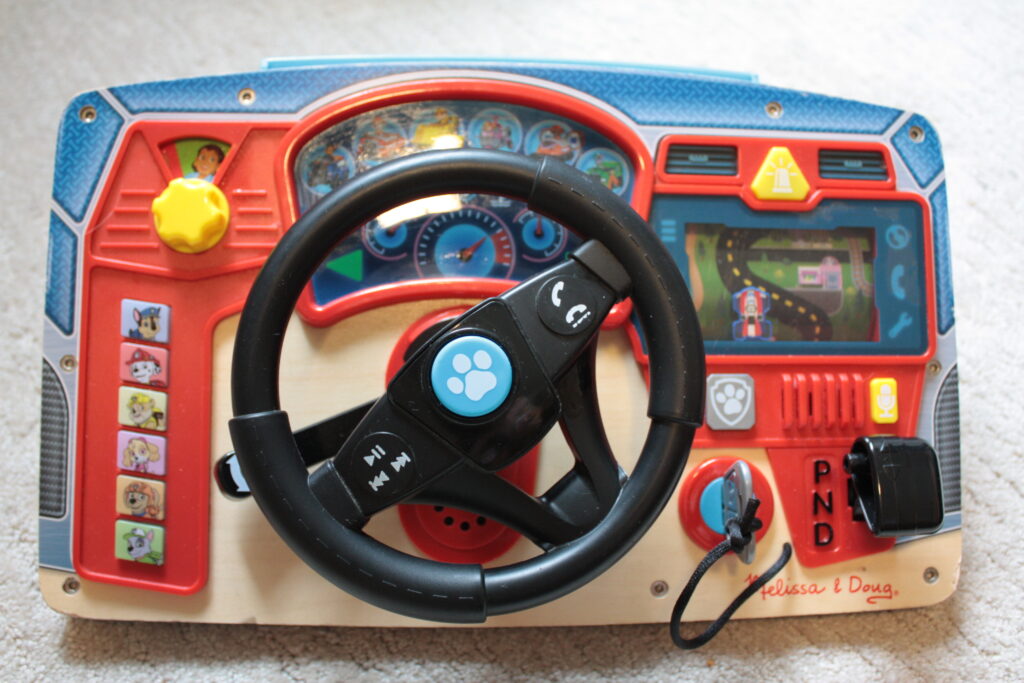 Good toys. Picture of a battery operated toy steering wheel.