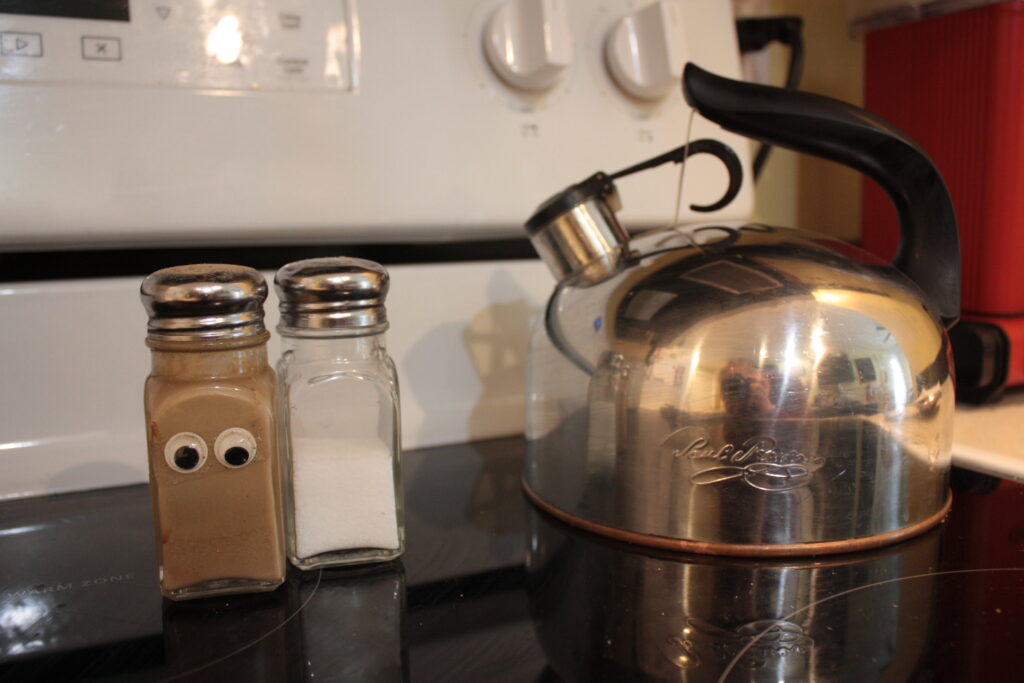 googly eyes on pepper shaker, whimsy, quirky decor