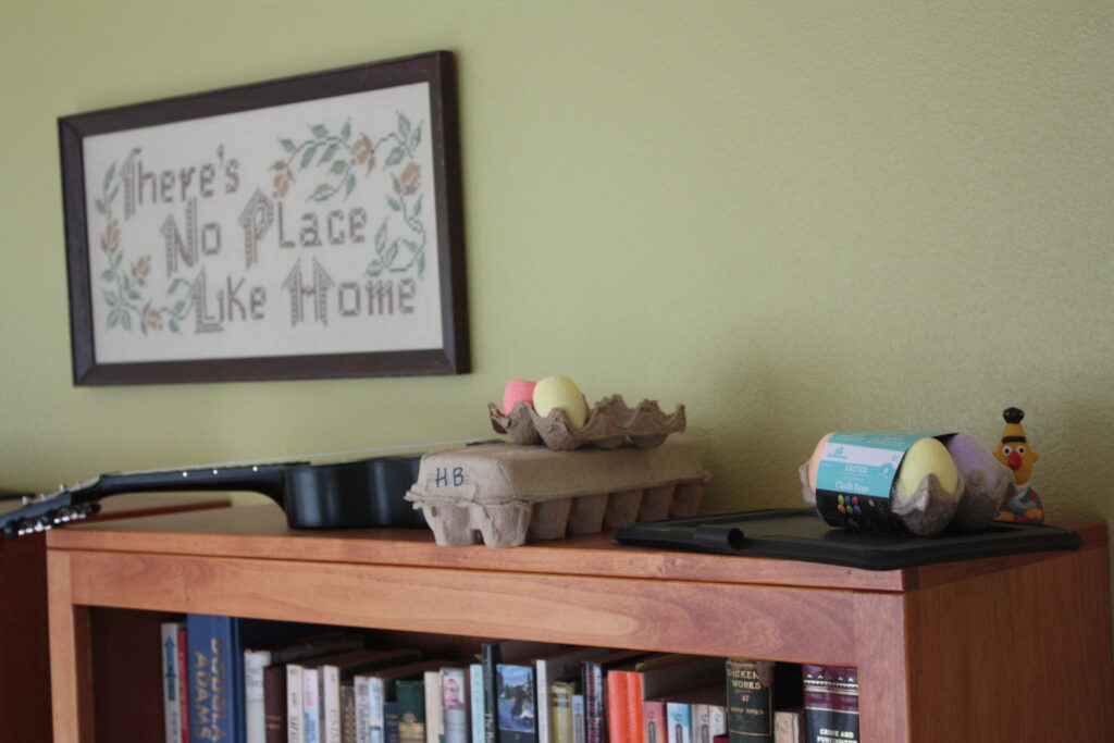 value of family, top of bookshelf, toys